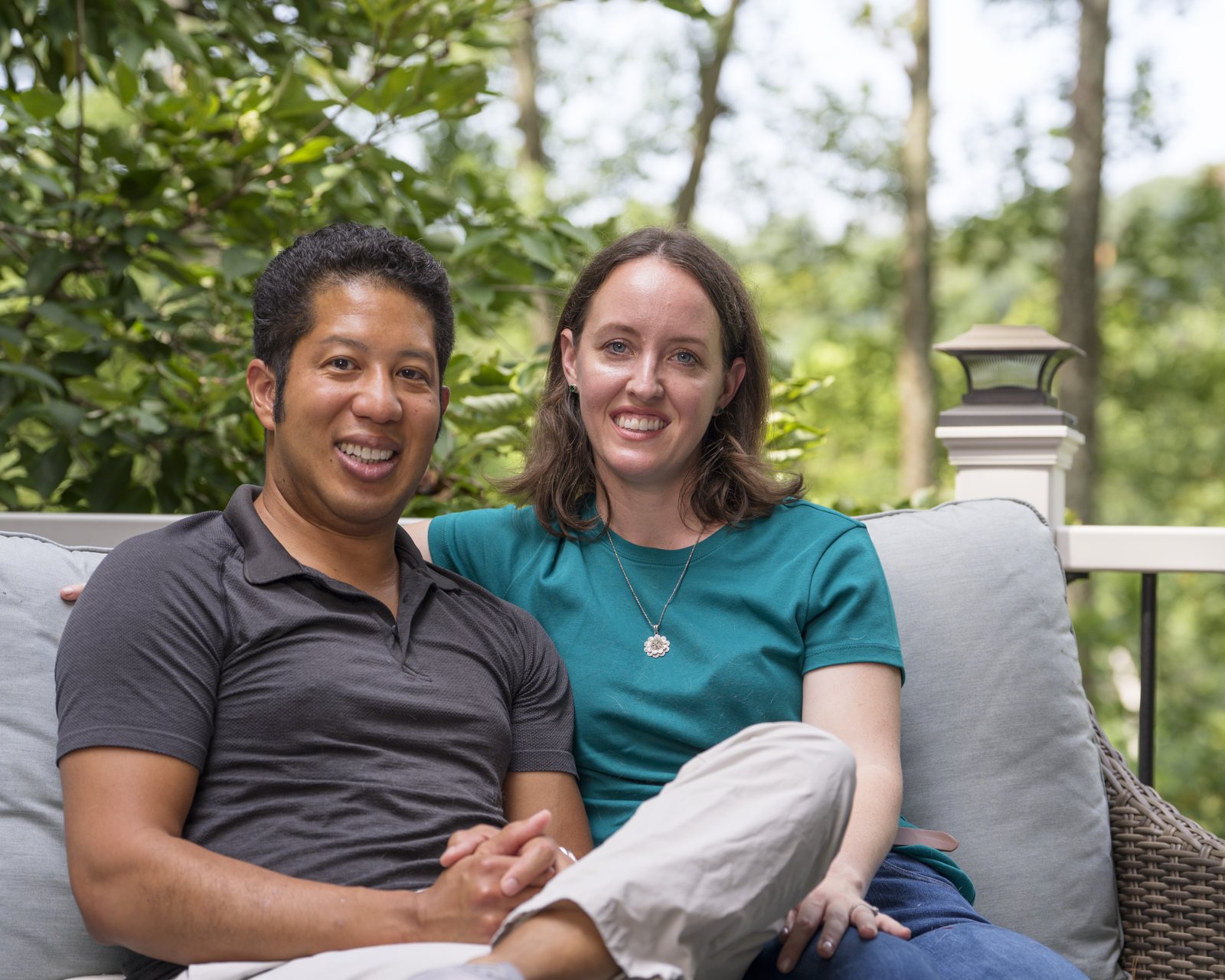 Brittany and her husband Fernando on their back deck in Vienna