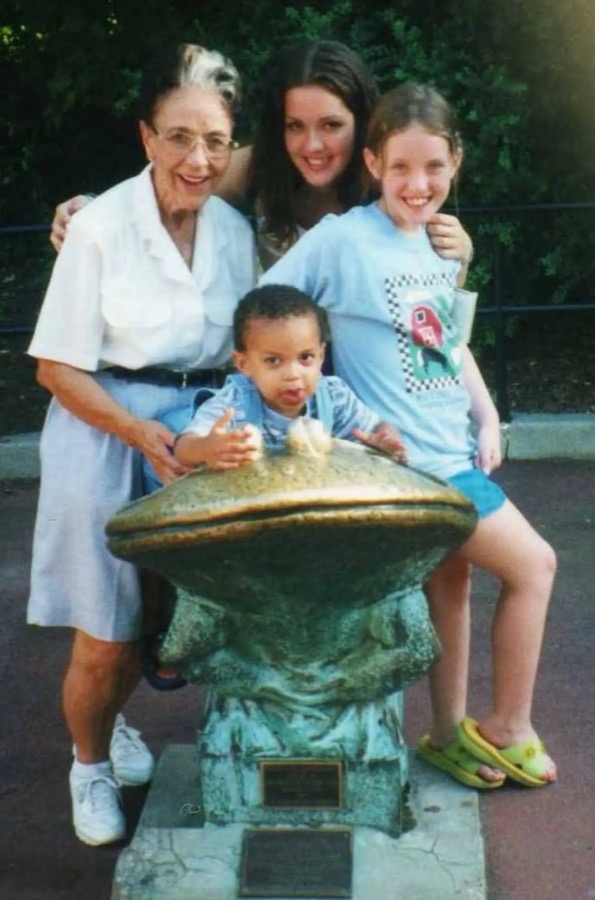 Me as a child with my grandmother and siblings at the zoo
