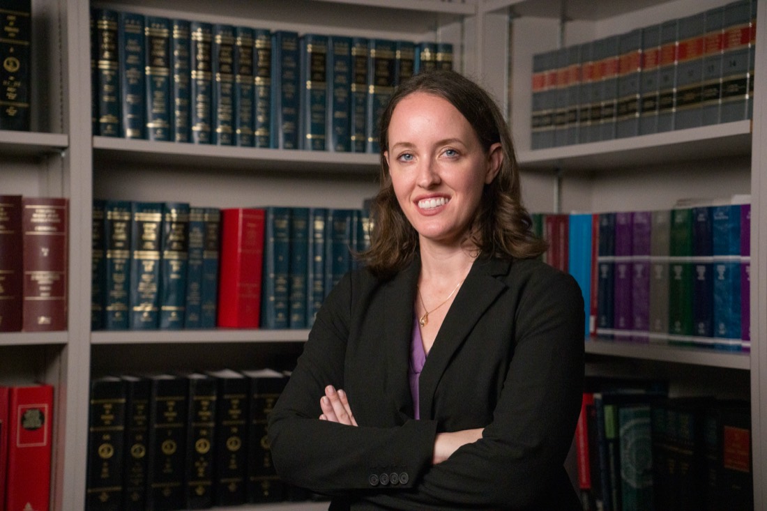 Brittany Dunn-Pirio in a law library